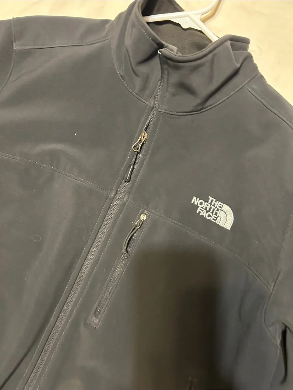 The North Face Men's Dark Gray Softshell Jacket with High Collar
